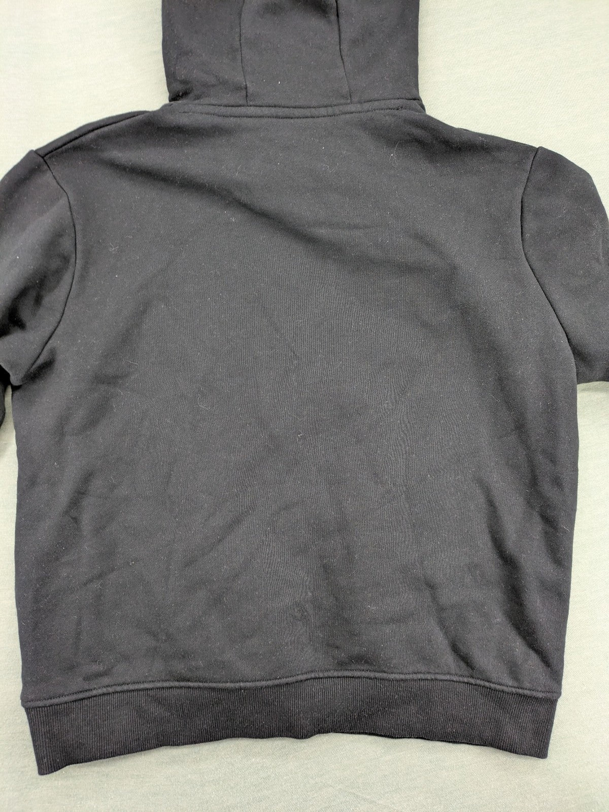 Ellesse grey hoodie with large logo, kangaroo pocket, and drawstring hood.