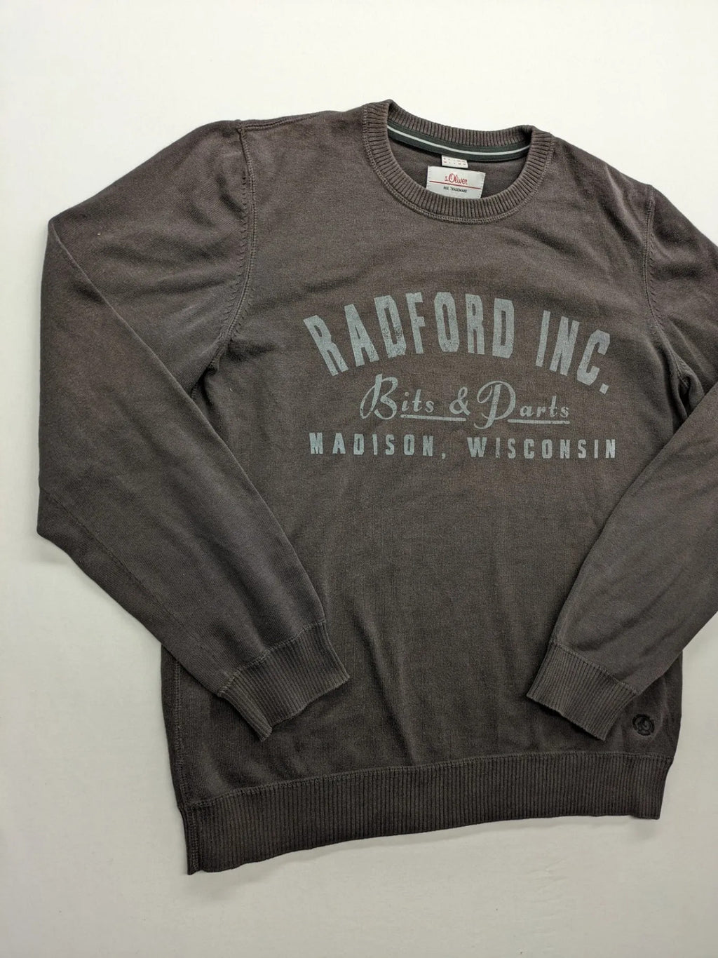 s.Oliver brown turtle neck jumper with "Radford Inc." graphic print and ribbed cuffs.