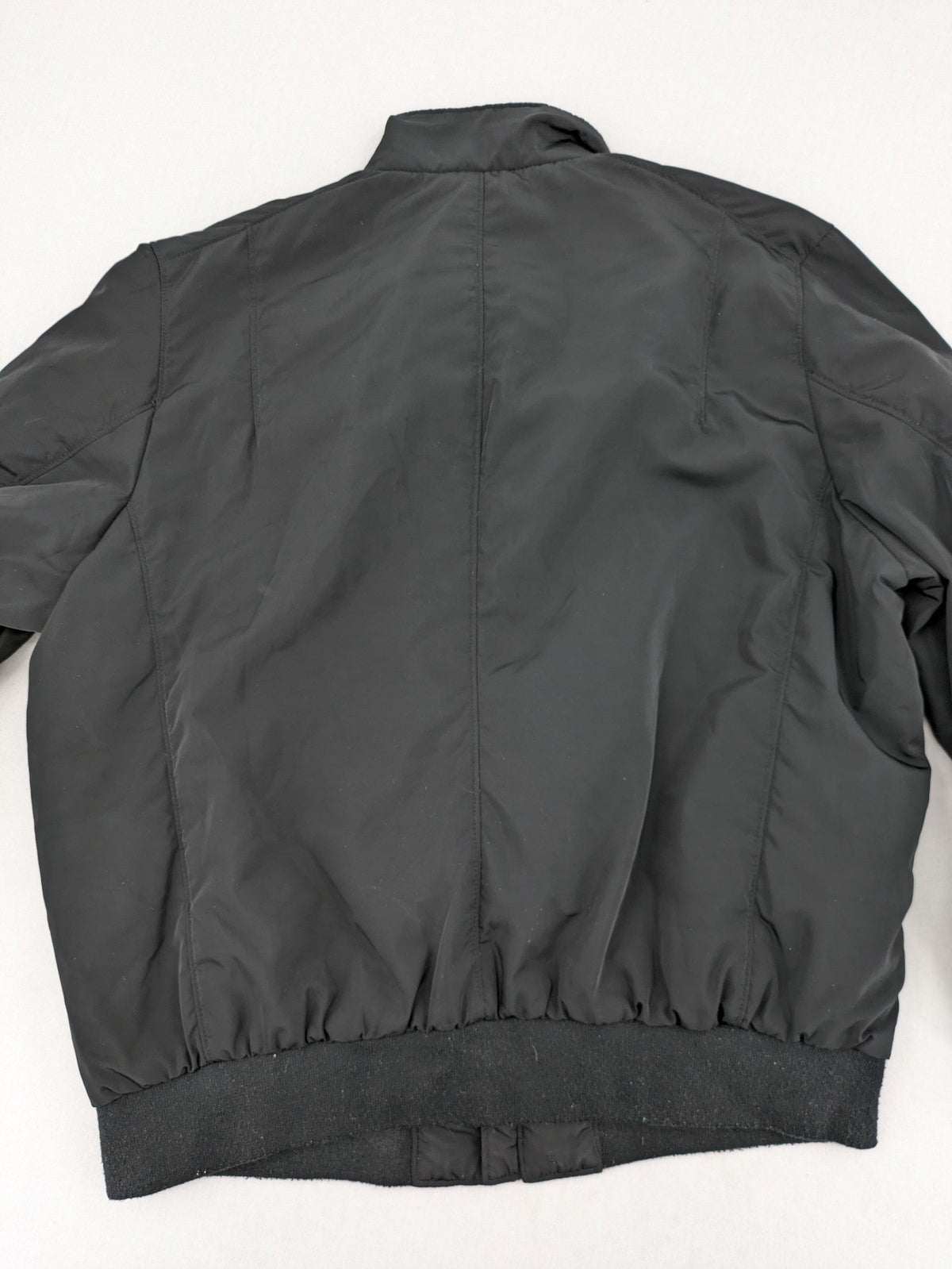Rover & Lakes black bomber jacket padded interior, stand collar, zip front, multiple pockets.