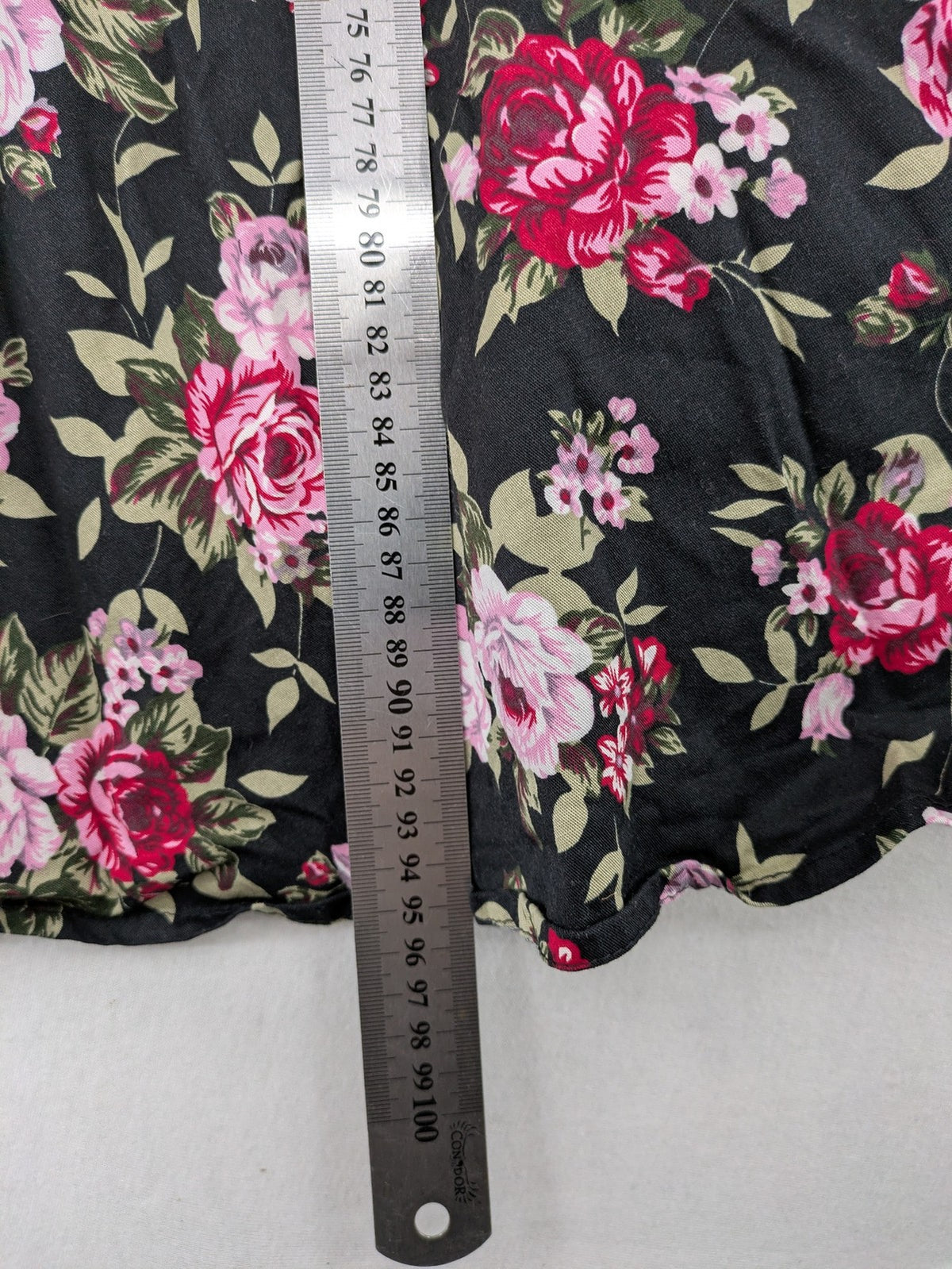 M/L black A-line dress with floral skirt and lace trim details.