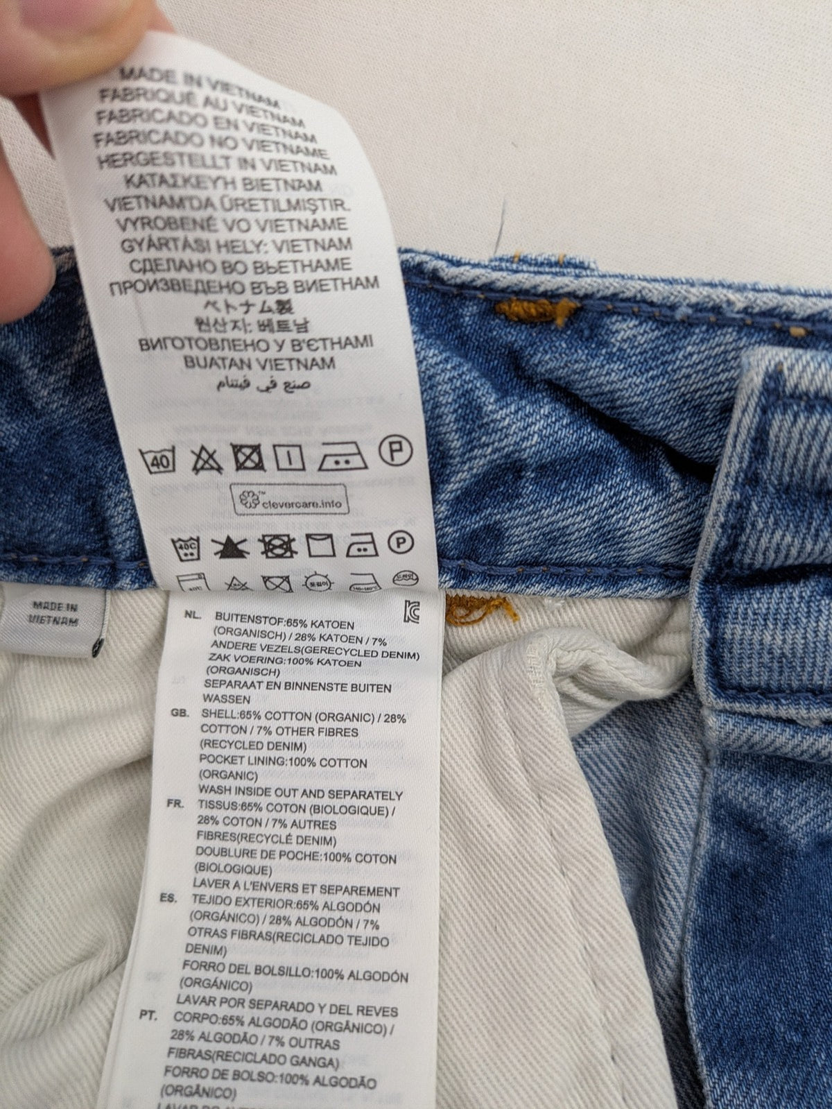 G-Star Raw blue distressed high boyfriend jeans with ripped details and classic button closure.