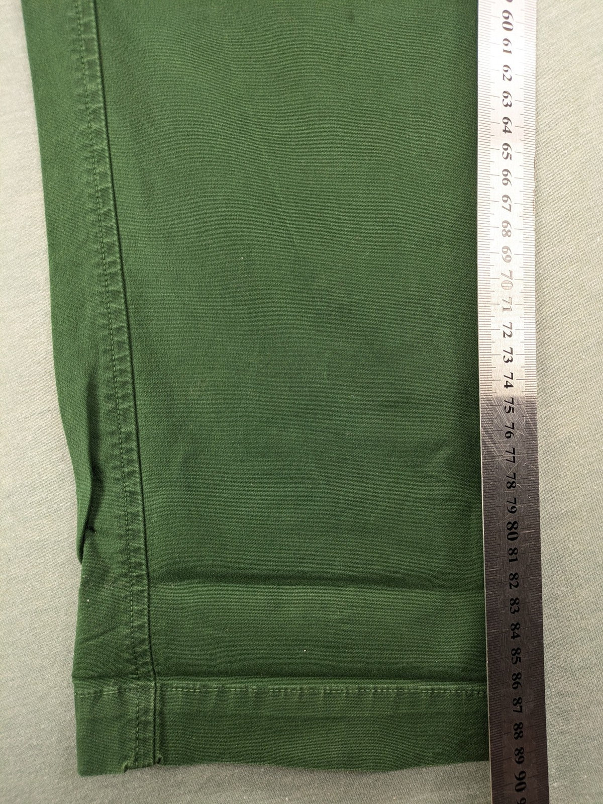 Mason's green chino pants with striped red and blue waistband, cotton stretch material.