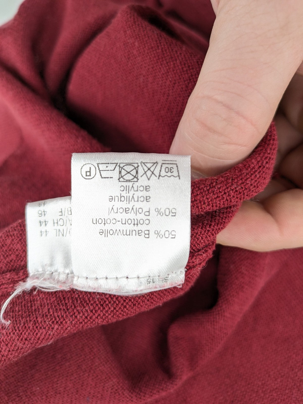 Les Corps burgundy turtle neck jumper with ribbed details and soft cotton blend material.