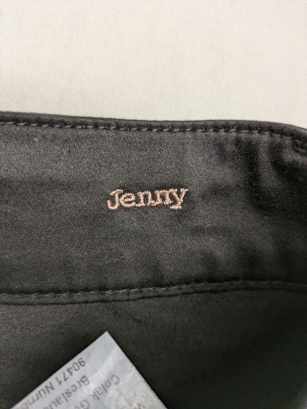 Colac black straight jeans high waist with double button, zipper pockets, and stretch material.