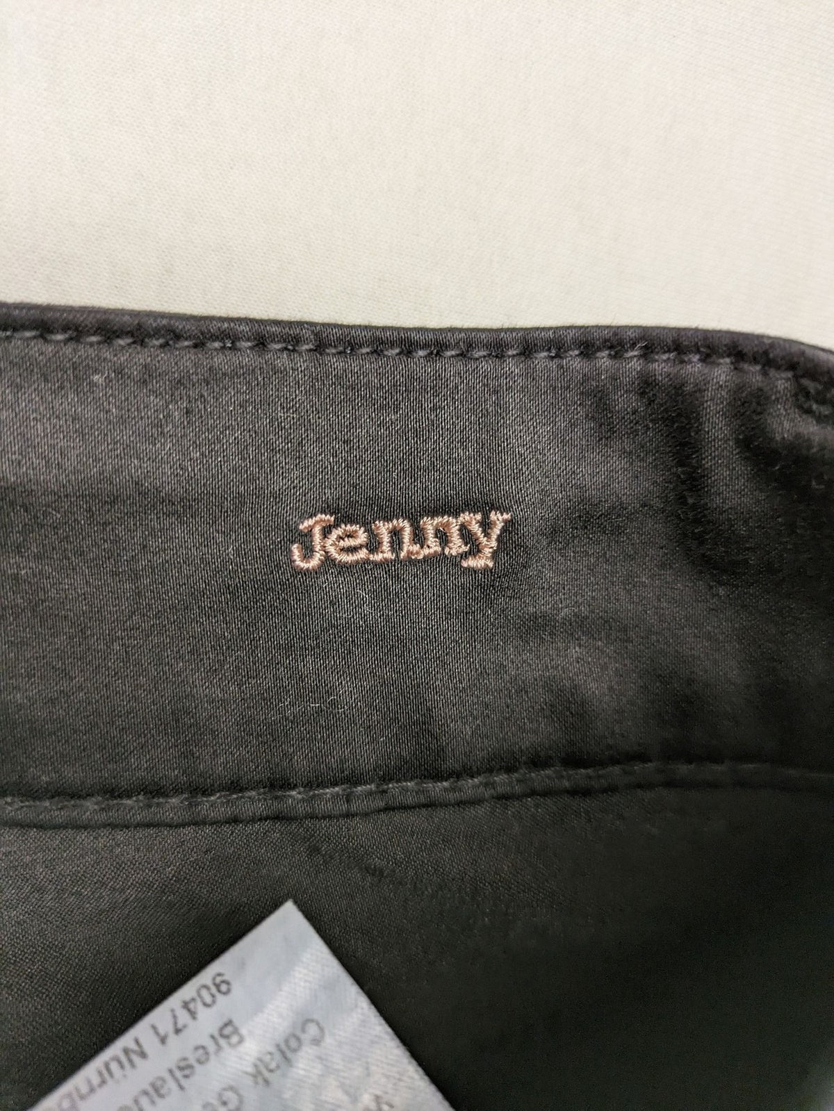 Colac black straight jeans high waist with double button, zipper pockets, and stretch material.