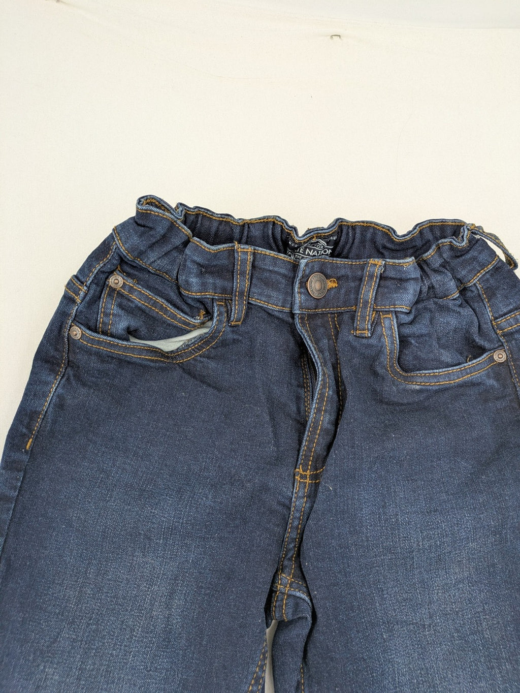 Skate Nation blue straight jeans 5-pocket design with adjustable waistband and dark wash.