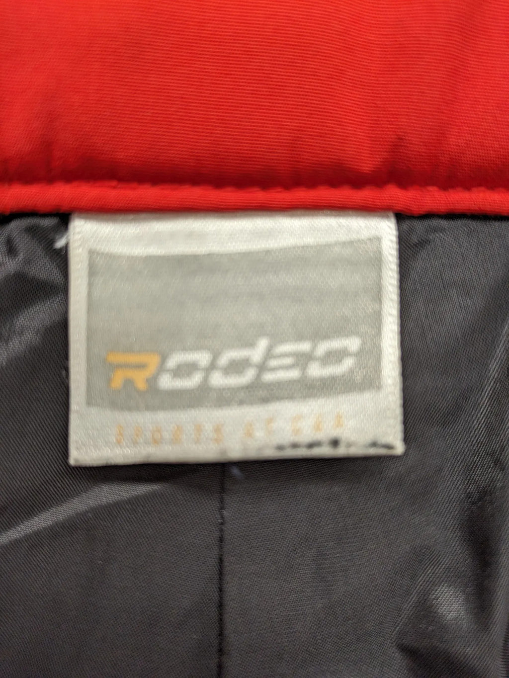 Rodeo red ski pants padded design adjustable belt multiple zip pockets