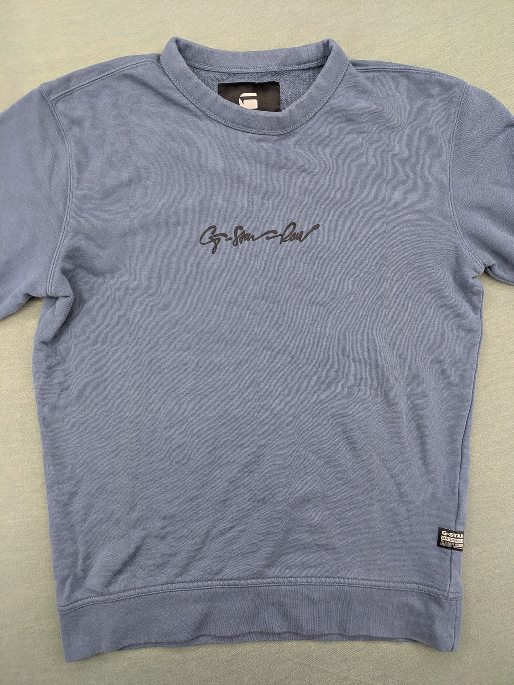 G-Star Raw blue turtle neck jumper with subtle logo on chest, made from organic cotton blend.