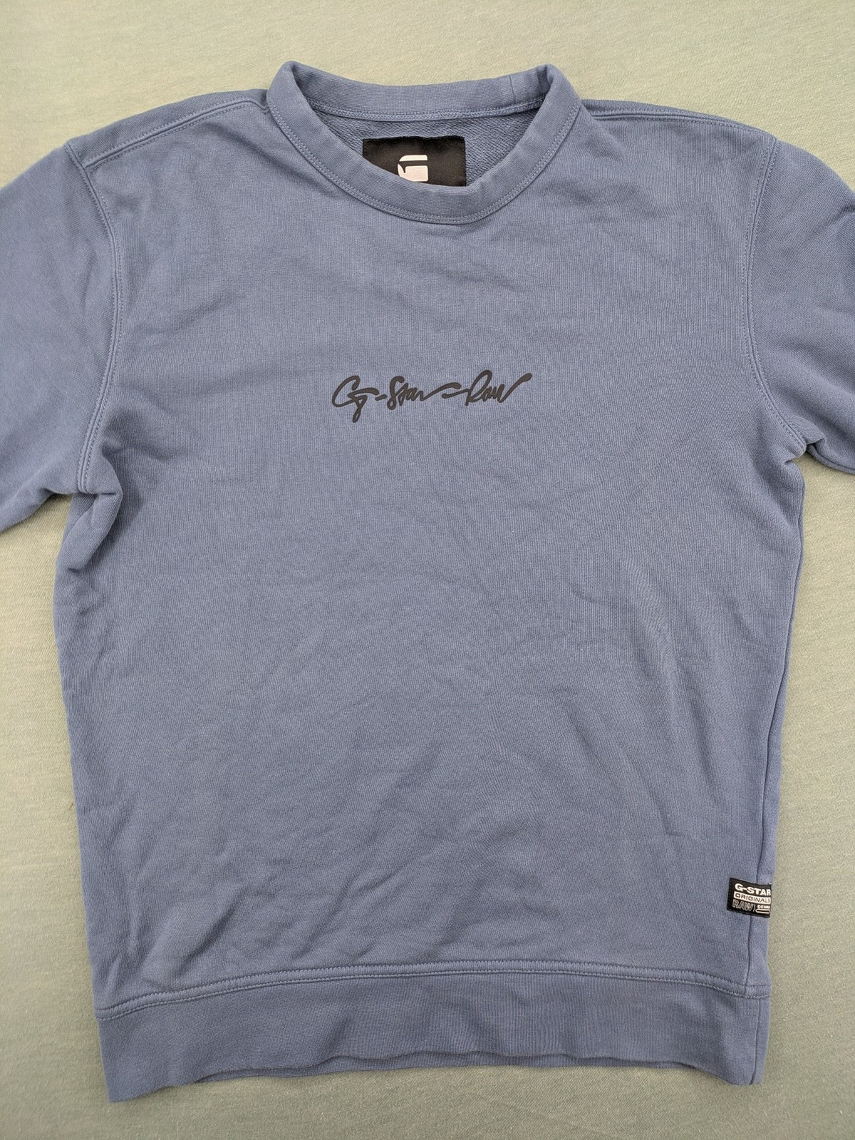 G-Star Raw blue turtle neck jumper with subtle logo on chest, made from organic cotton blend.