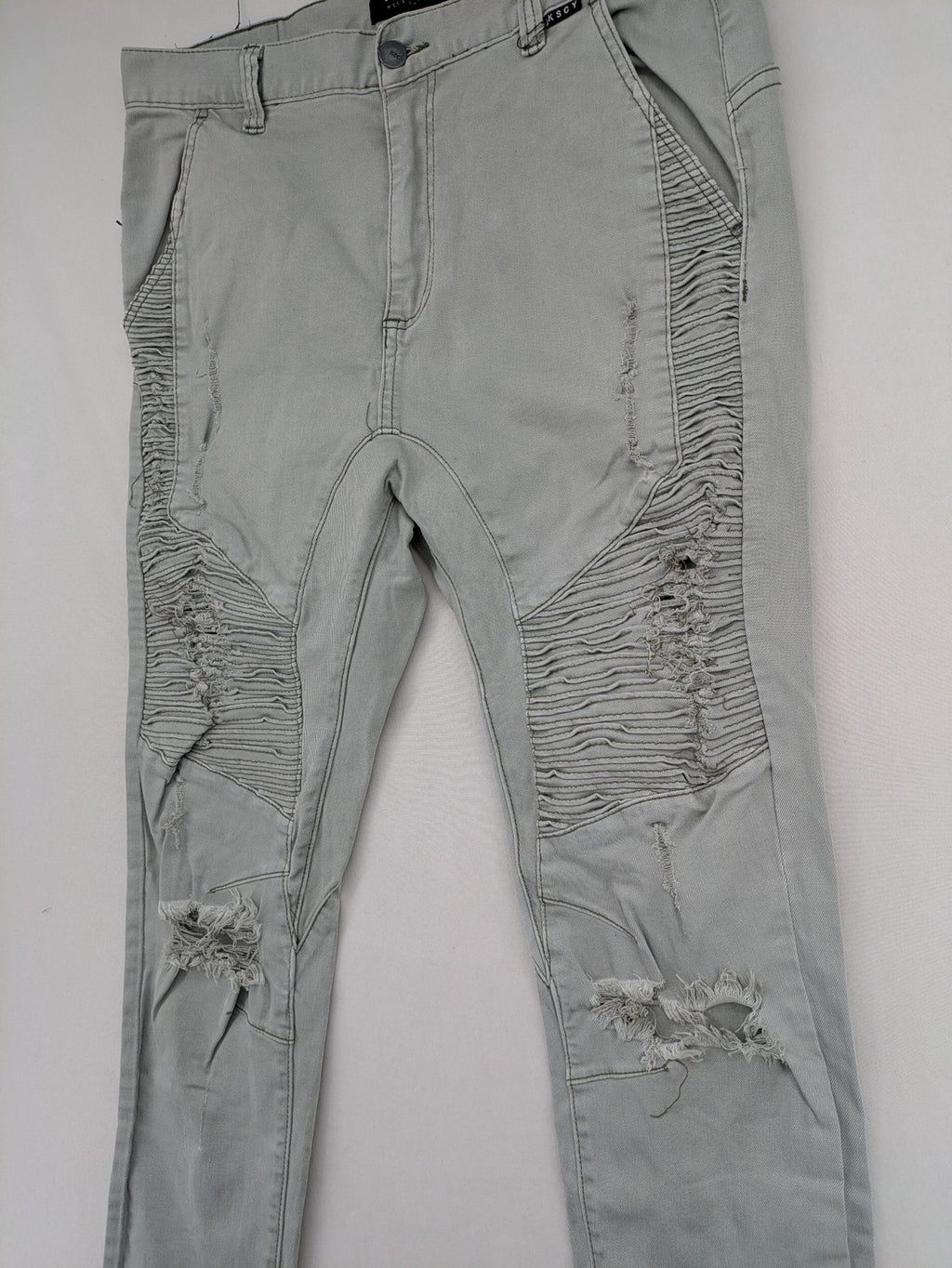 KSCY grey straight jeans with distressed details and ribbed biker inserts.
