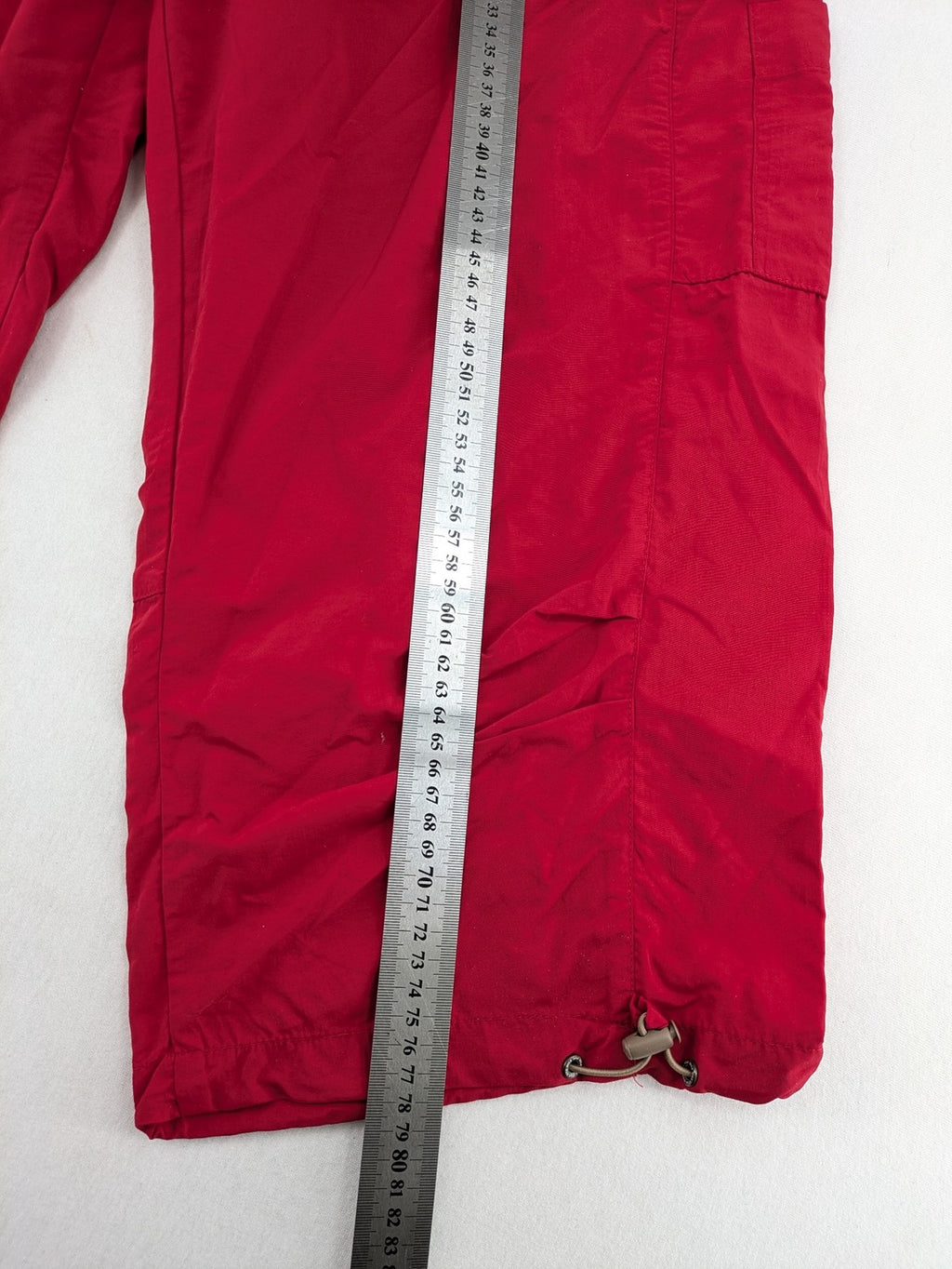 Skila red outdoor capri pants lightweight polyamide with adjustable drawstrings and pockets.