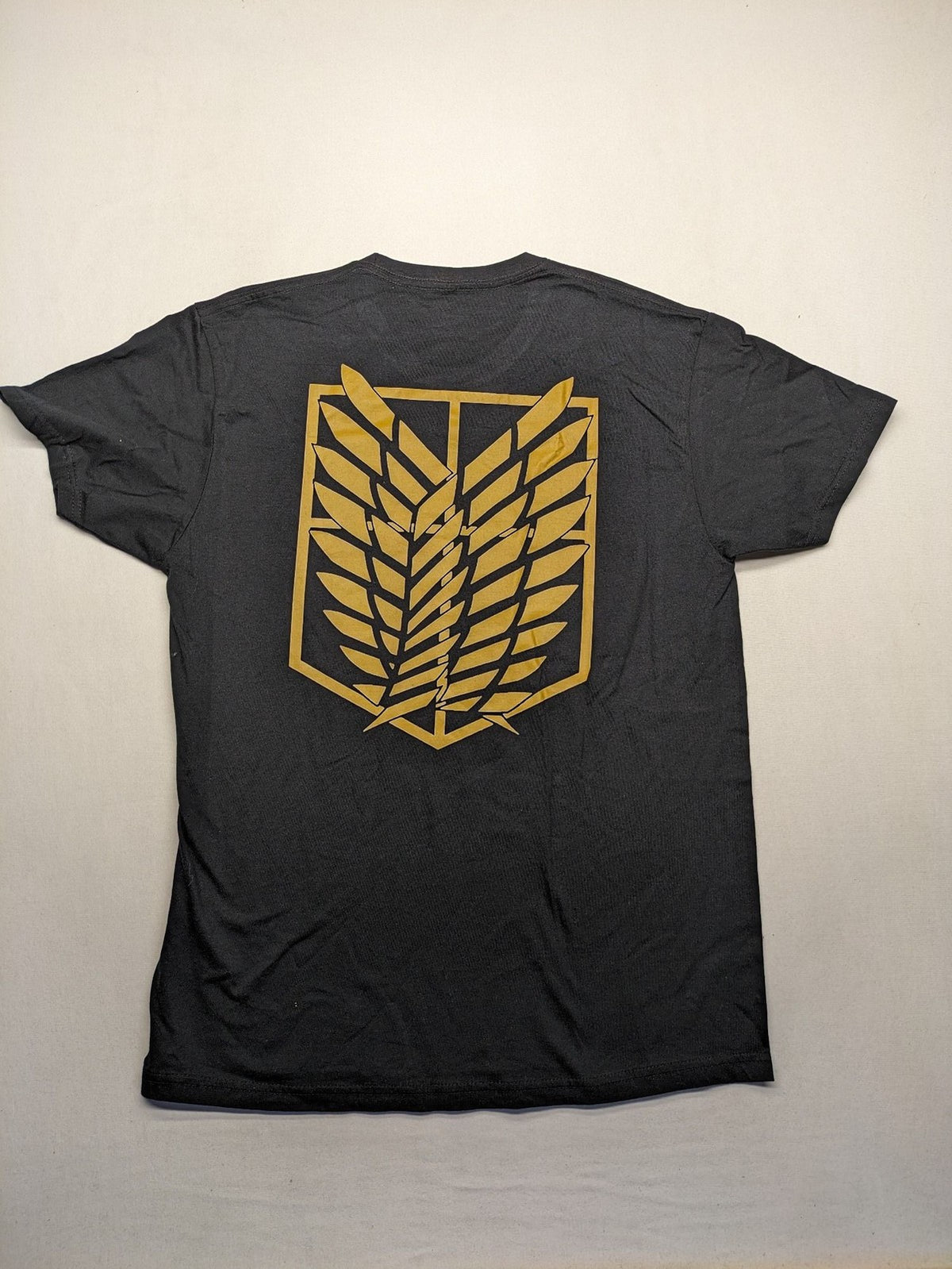 Attack On Titan black t-shirt gold Scout Regiment Wings of Freedom logo front and back.