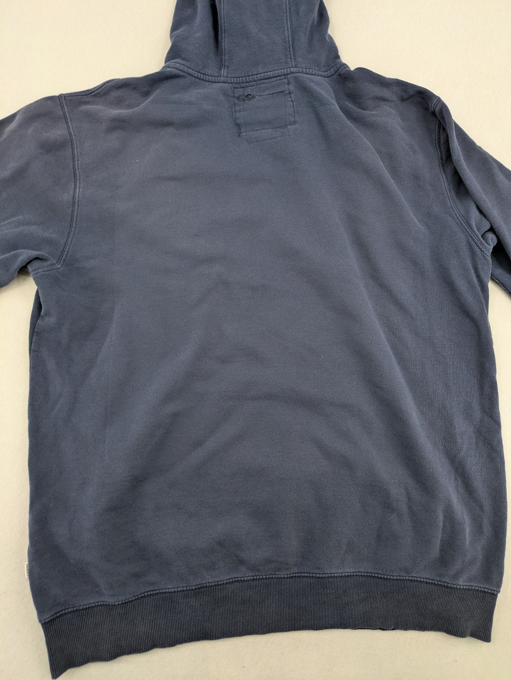 Vans zip-through hoodie navy blue with large yellow logo and kangaroo pocket.