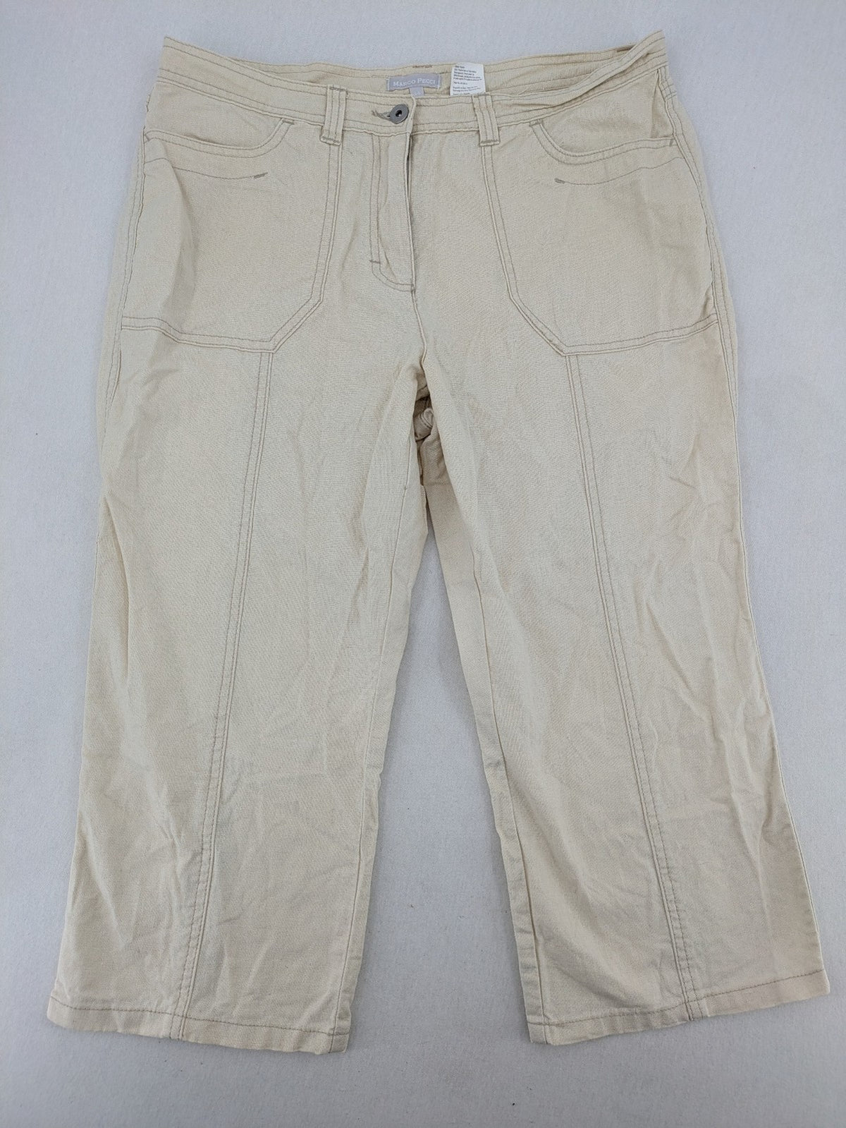 Marco Pecci beige capri pants with prominent seam details and practical pockets.
