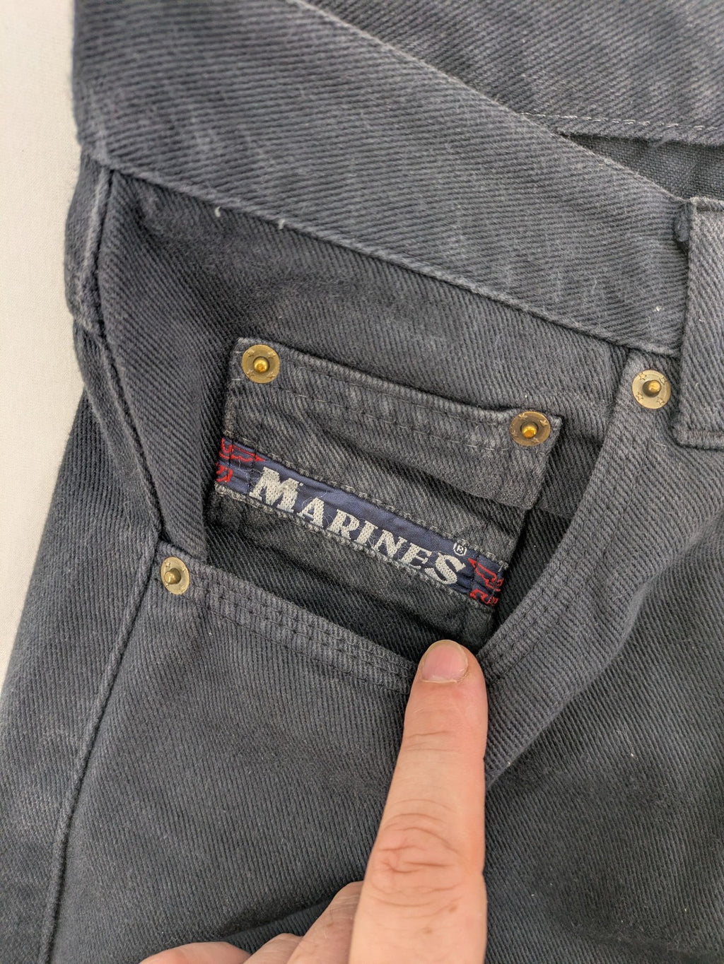 Marines blue straight jeans regular fit with button fly and logo patch detail.
