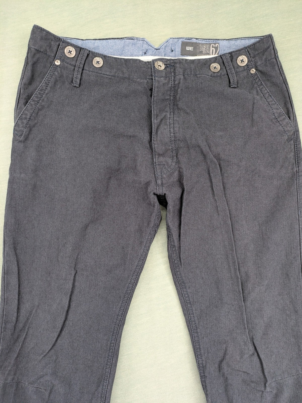WE grey straight leg chinos 100% cotton button fly with unique brand buttons