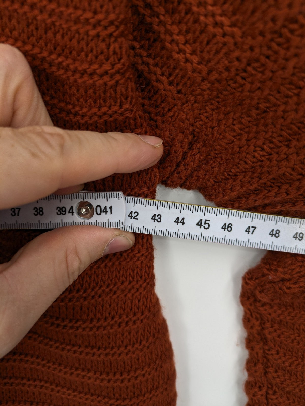 Braun brown turtle neck jumper with decorative cable knit pattern and long sleeves.
