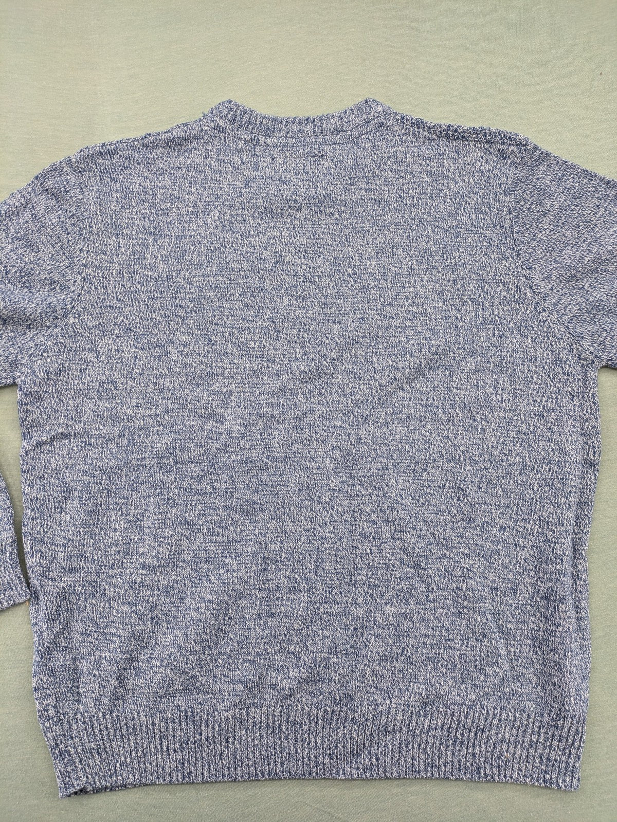 Canda blue-grey melange turtle neck jumper with long sleeves and round neckline.