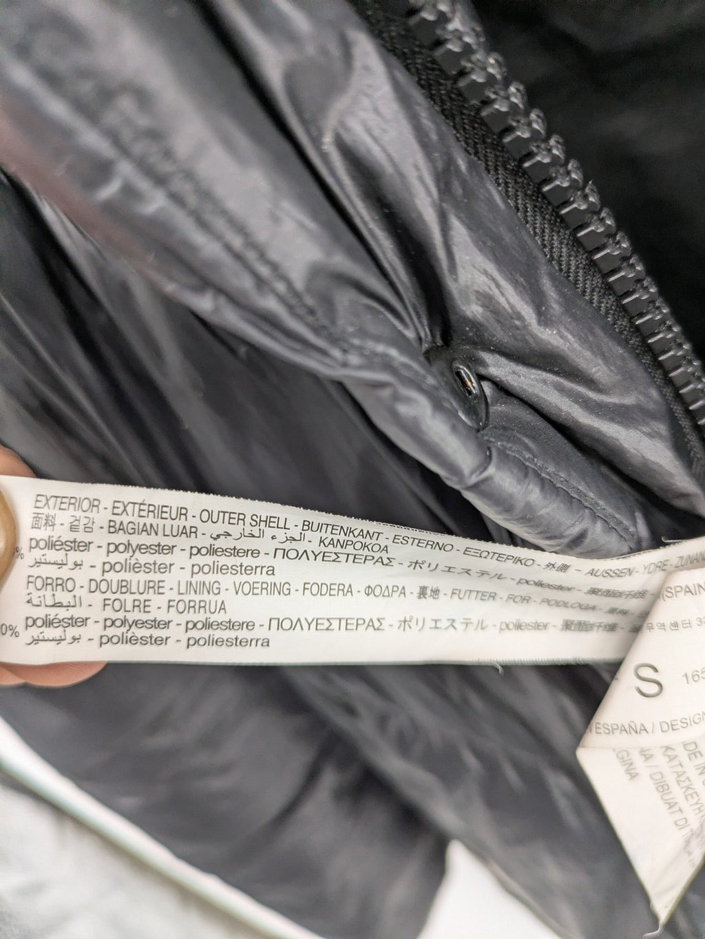 Stradivarius grey coat with chevron quilted pattern and hood, featuring zip closure and snap storm flap.