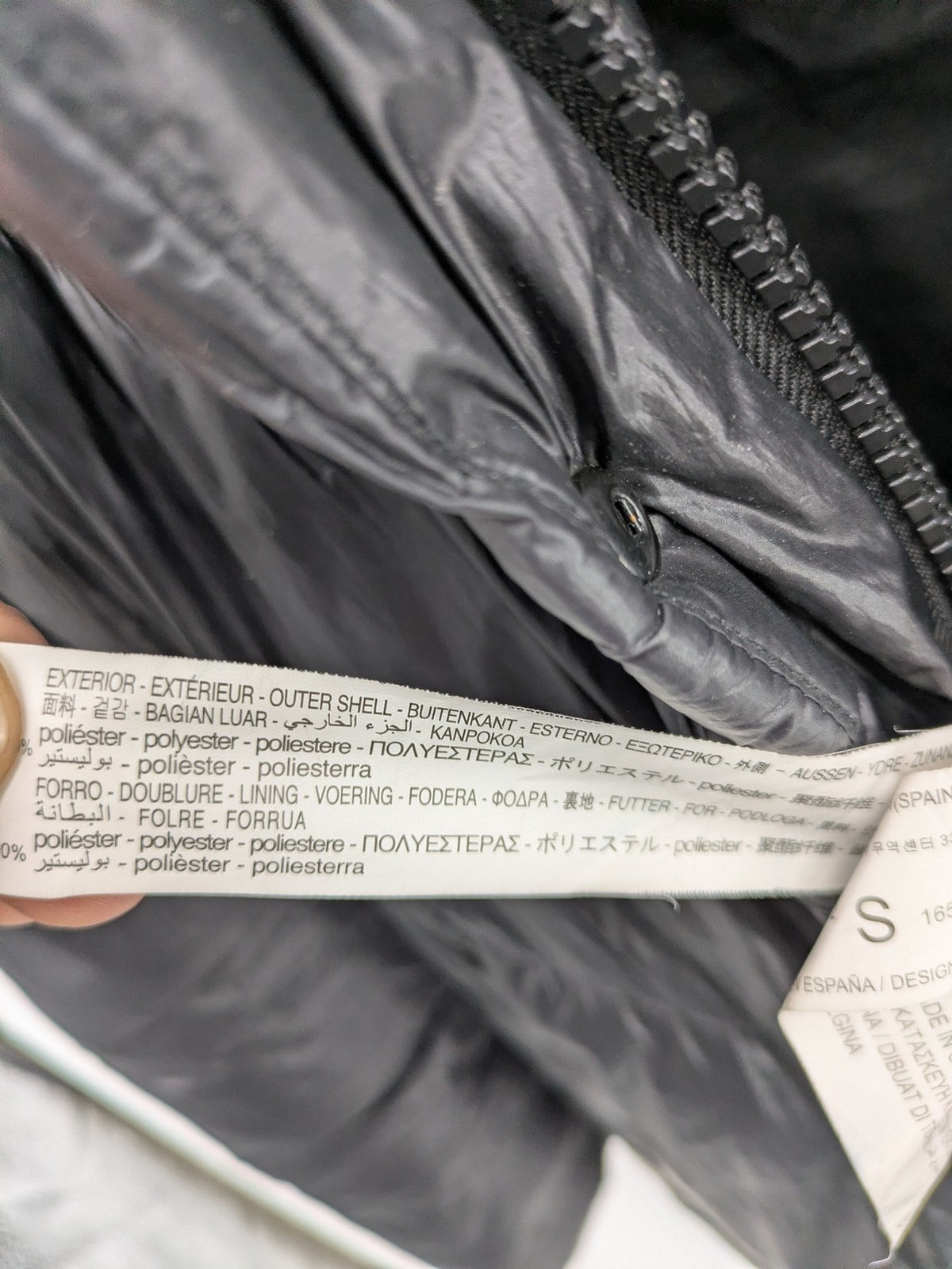 Stradivarius grey coat with chevron quilted pattern and hood, featuring zip closure and snap storm flap.
