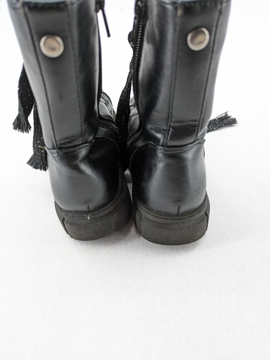 Graceland black combat boots with front lacing and chunky platform sole.