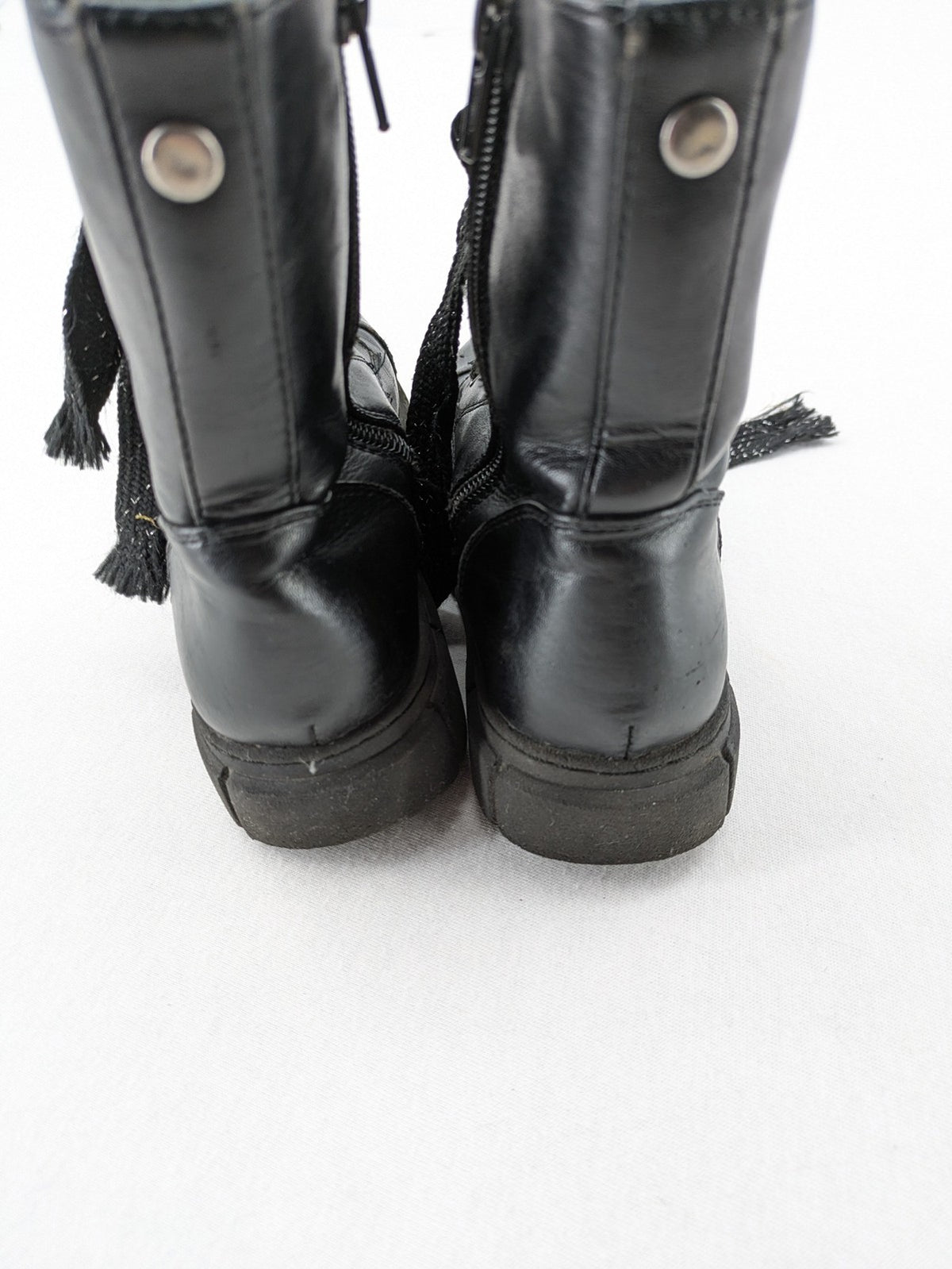 Graceland black combat boots with front lacing and chunky platform sole.