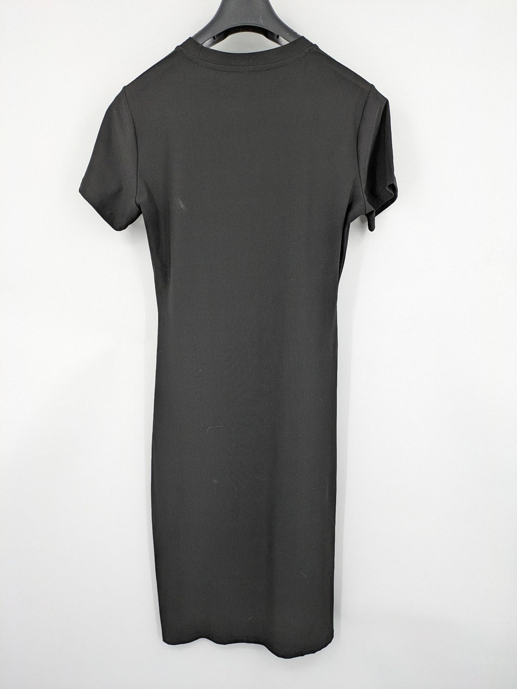 Milano black bodycon T-shirt dress with stylish print and side slit detail.