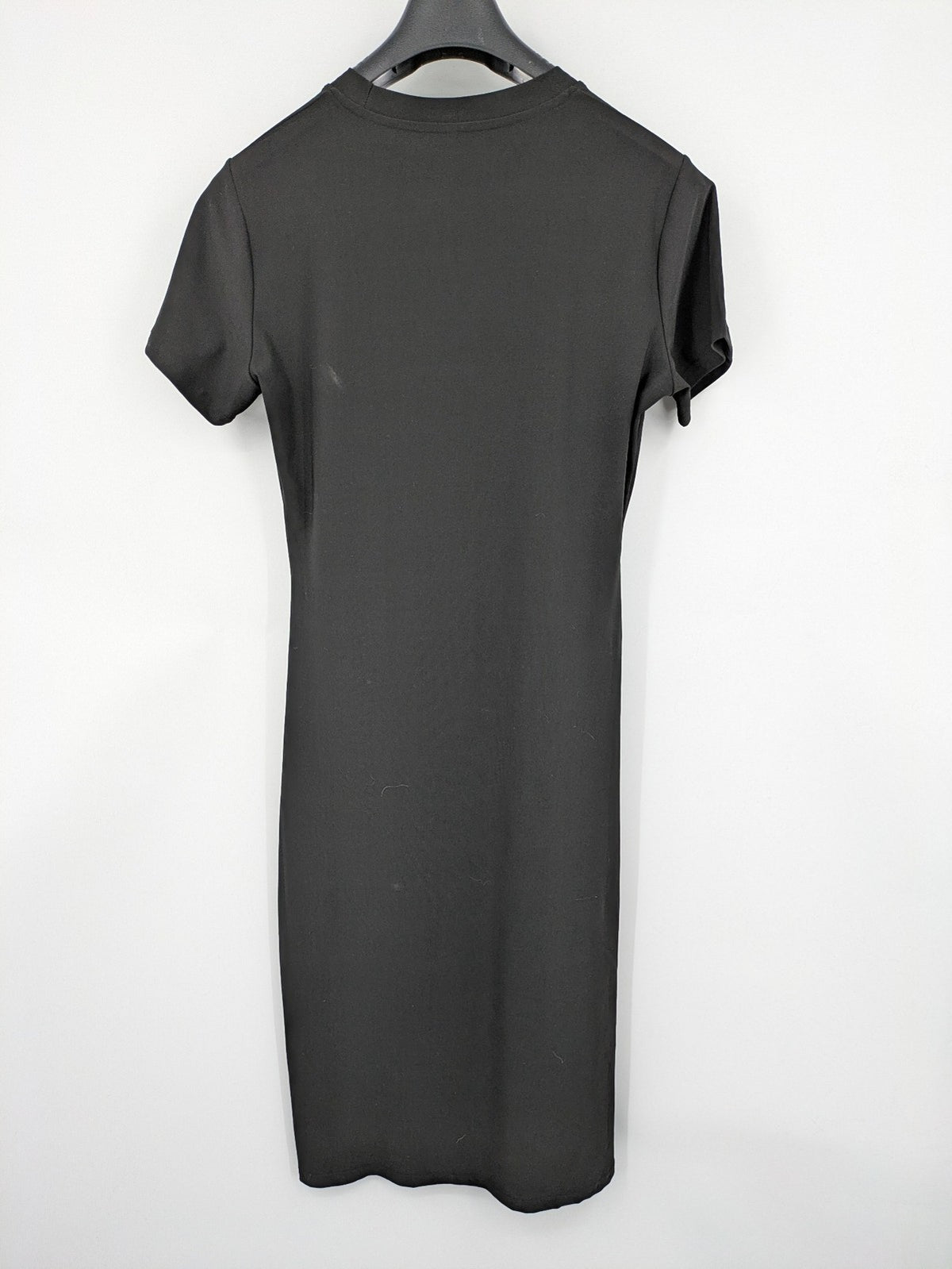 Milano black bodycon T-shirt dress with stylish print and side slit detail.