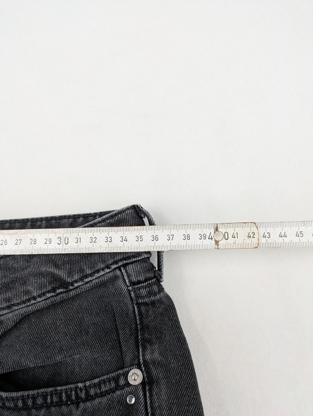 H&M Divided black straight jeans with allover rhinestone embellishments and classic five-pocket design.