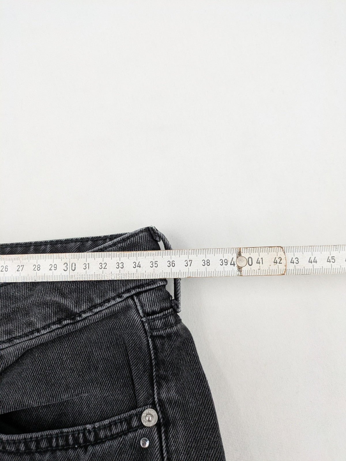 H&M Divided black straight jeans with allover rhinestone embellishments and classic five-pocket design.