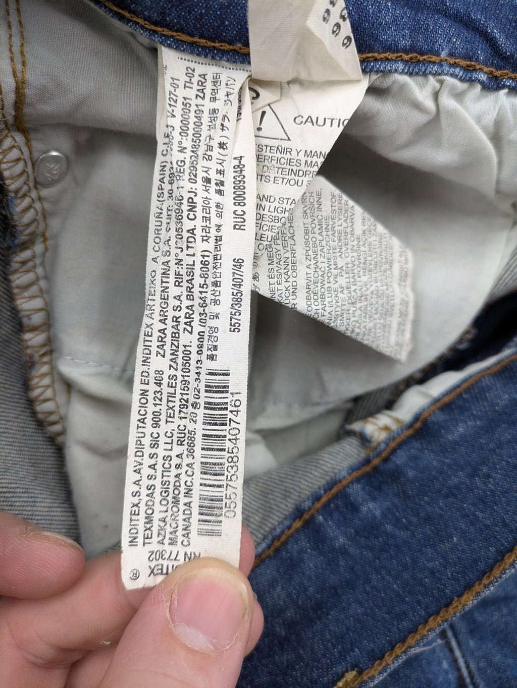 Zara blue straight jeans with medium wash, lightweight denim, and regular fit.
