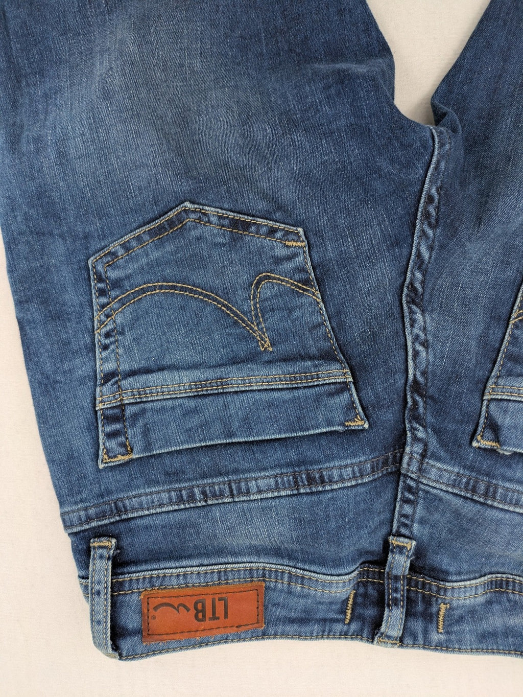 LTB blue bootcut jeans with classic 5-pocket design and low-rise fit.