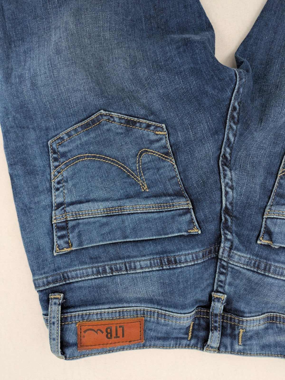 LTB blue bootcut jeans with classic 5-pocket design and low-rise fit.