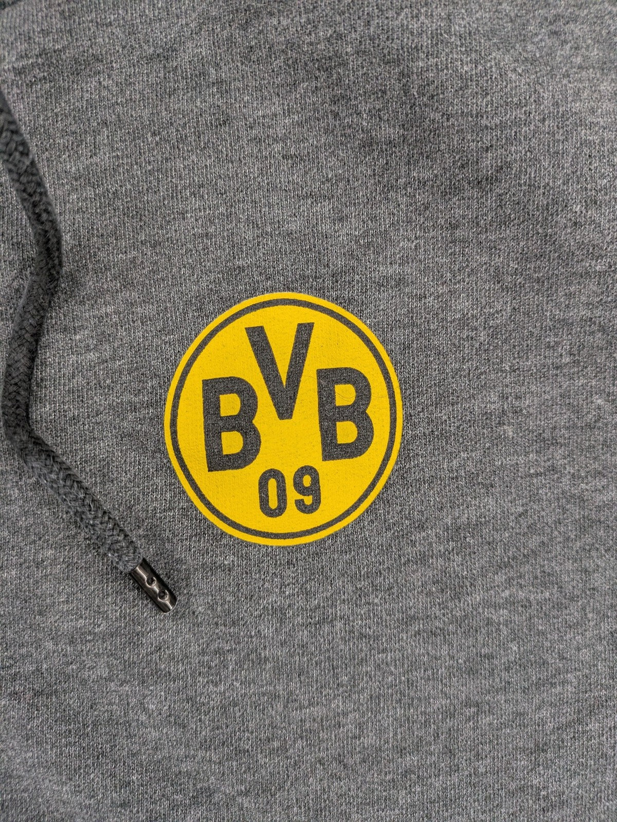 Borussia Dortmund grey and black hoodie with BVB 09 logo and full zip design.