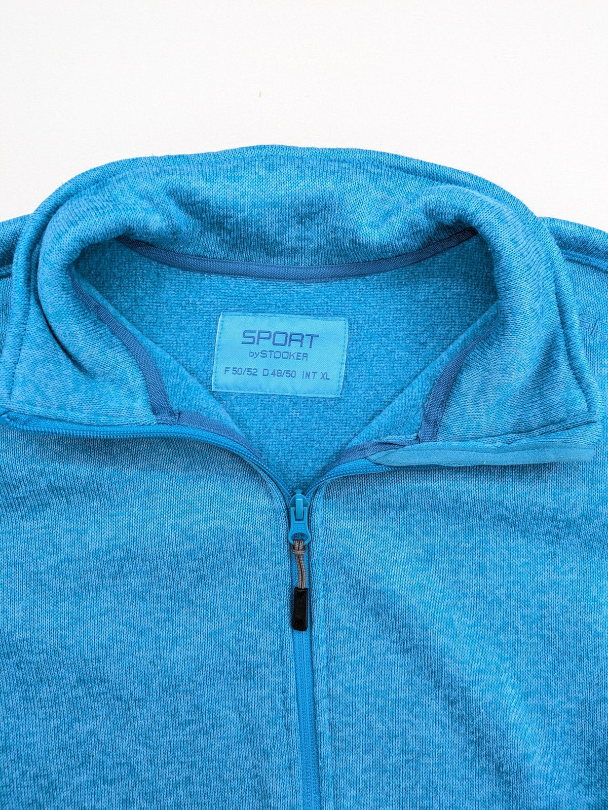 Stooker blue and turquoise fleece jacket with full zip and stand-up collar.
