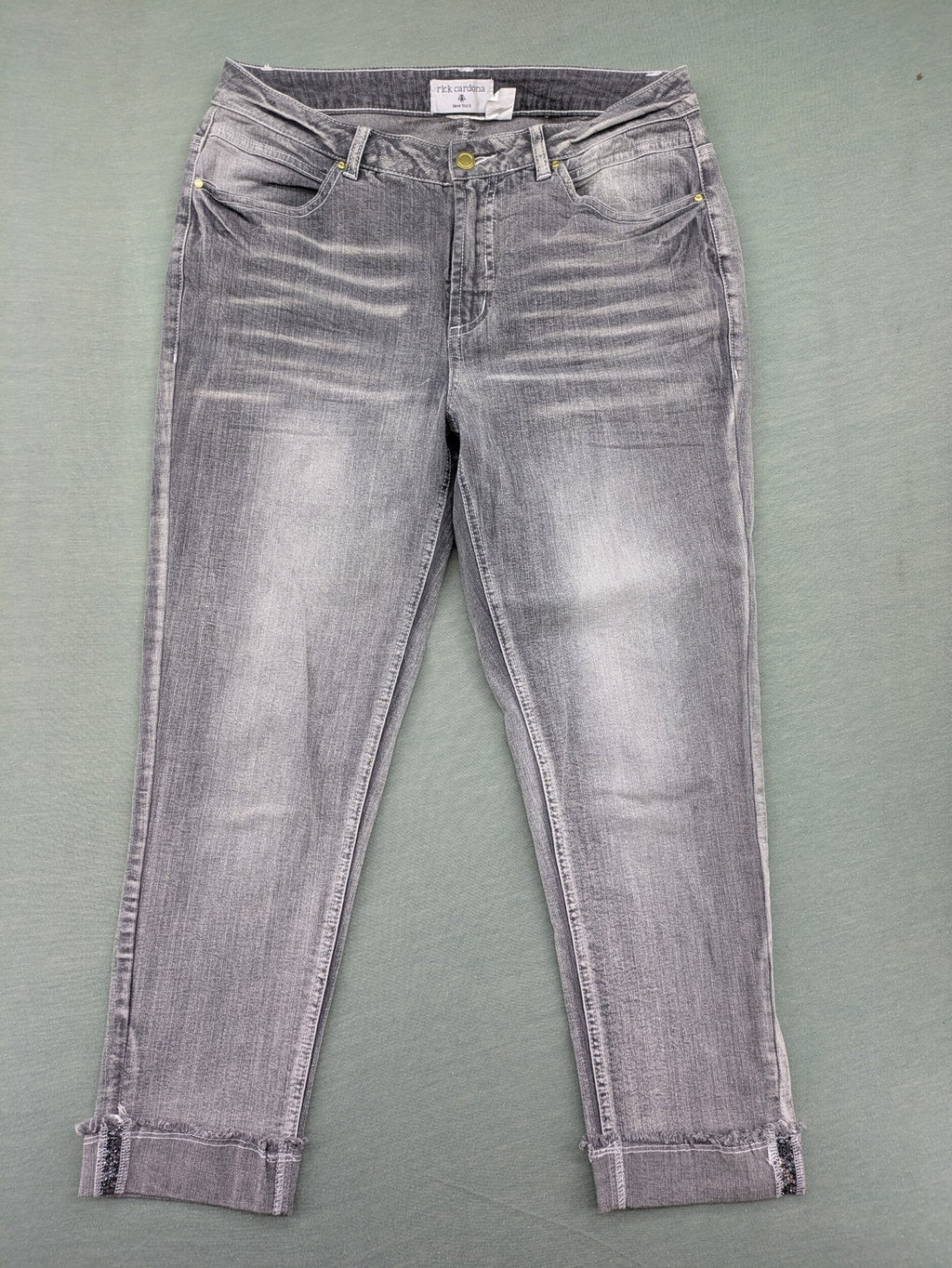 Rick Cardona grey cropped straight jeans with frayed hems and sparkling rhinestone details.