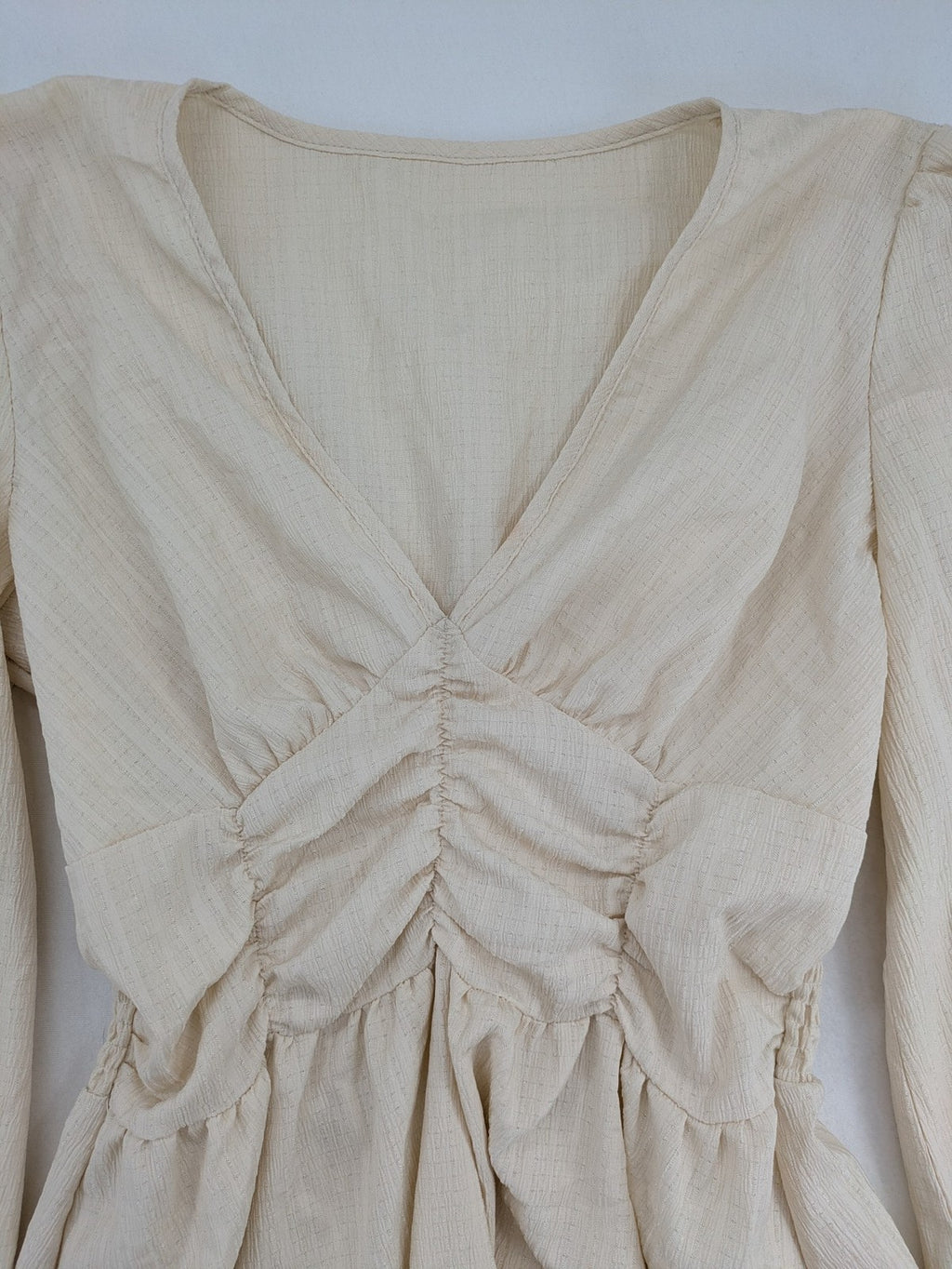SHEIN beige bridal party dress with V-neck, ruffled bodice, and bishop sleeves.