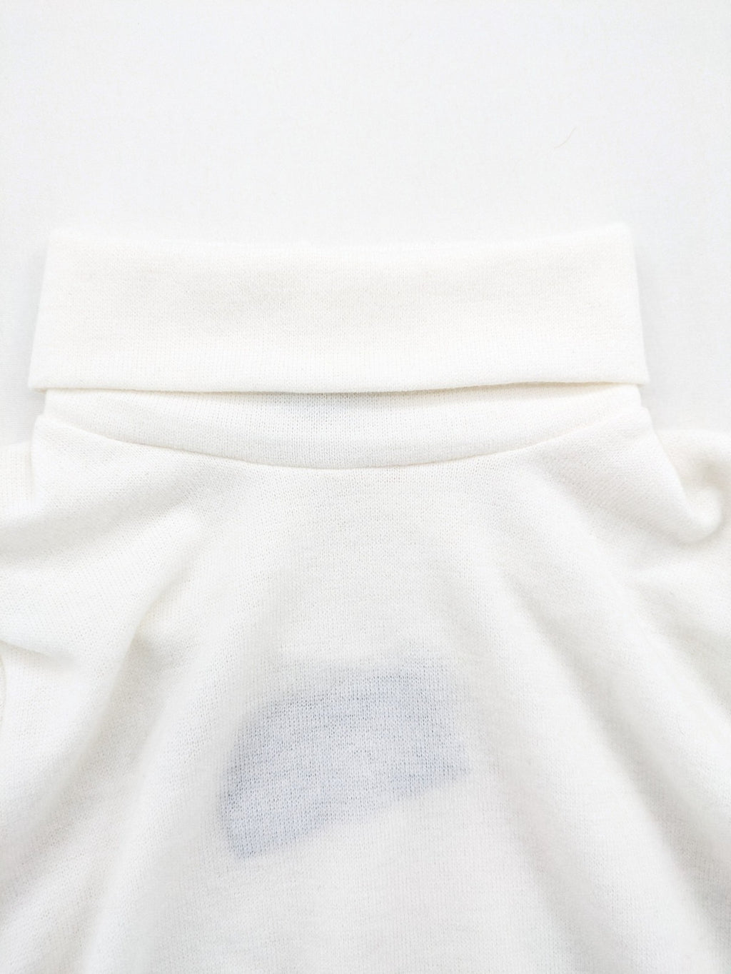Monica Braghini white turtle neck jumper soft fabric classic design with high collar.