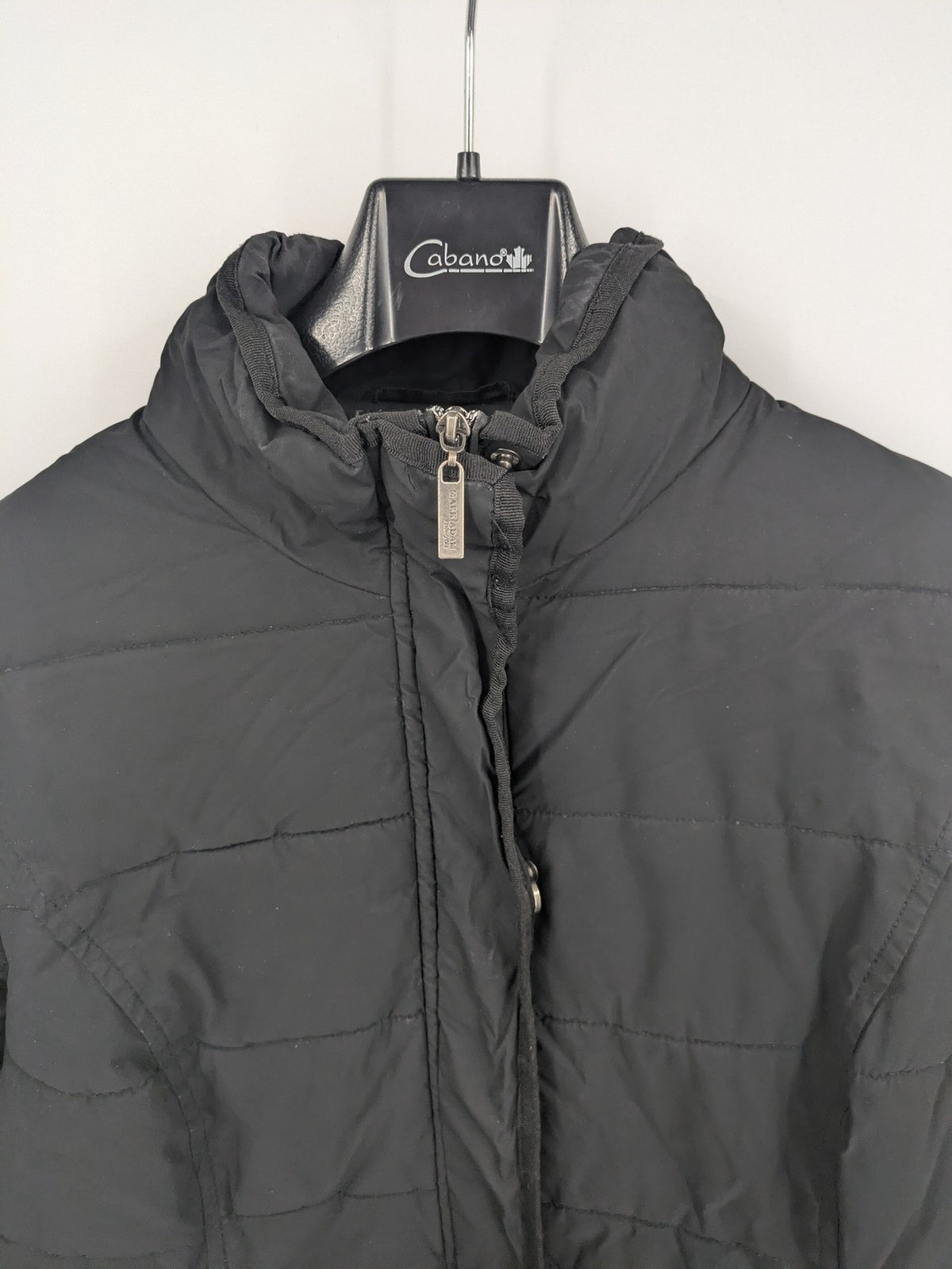 Mark Adam grey quilted jacket with high collar and buttoned flap pockets.
