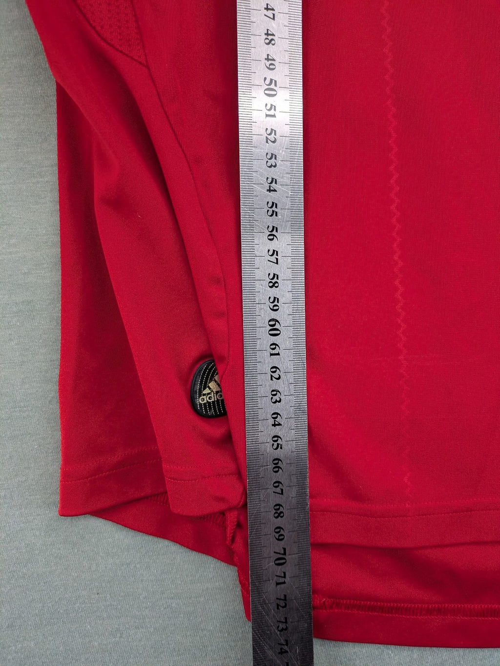 Adidas red soccer uniform with embroidered FC Bayern München crest and T-Mobile logo.