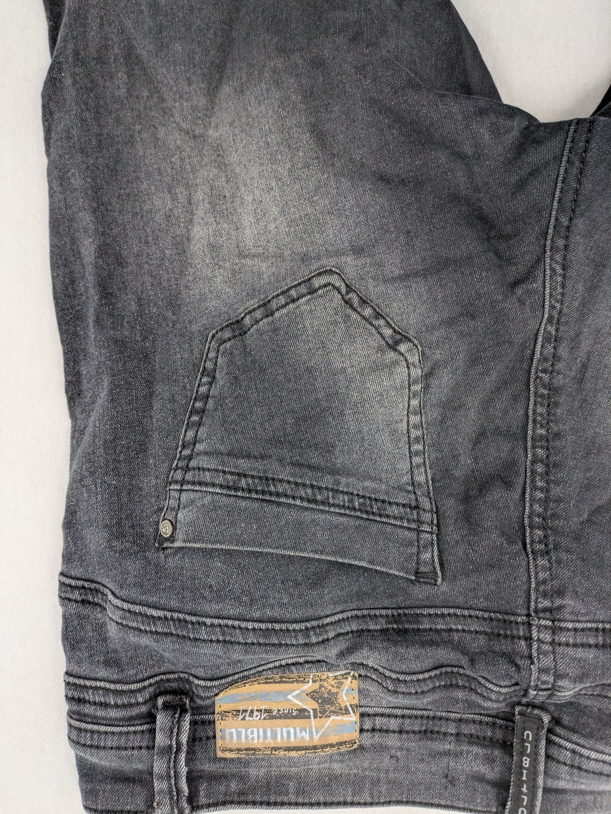 multiblu grey skinny jeans faded wash five-pocket design with button closure