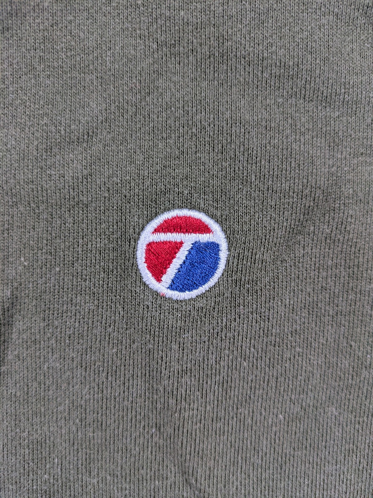 Topman green turtle neck jumper with white colorblock and yellow piping, embroidered logo.