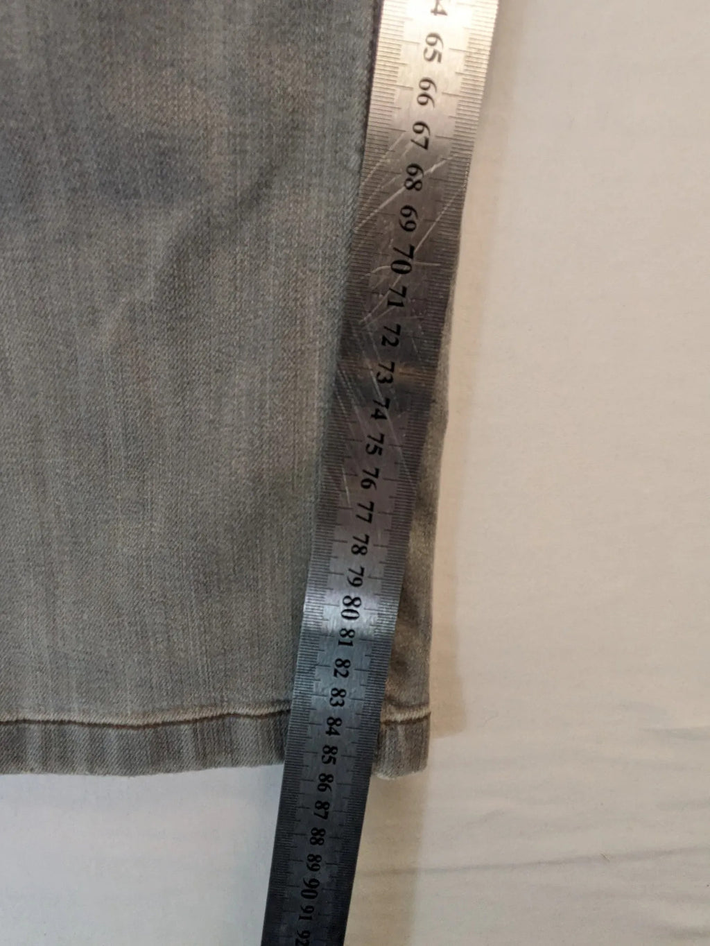 BRAX grey straight jeans with classic 5-pocket style and washed denim finish.