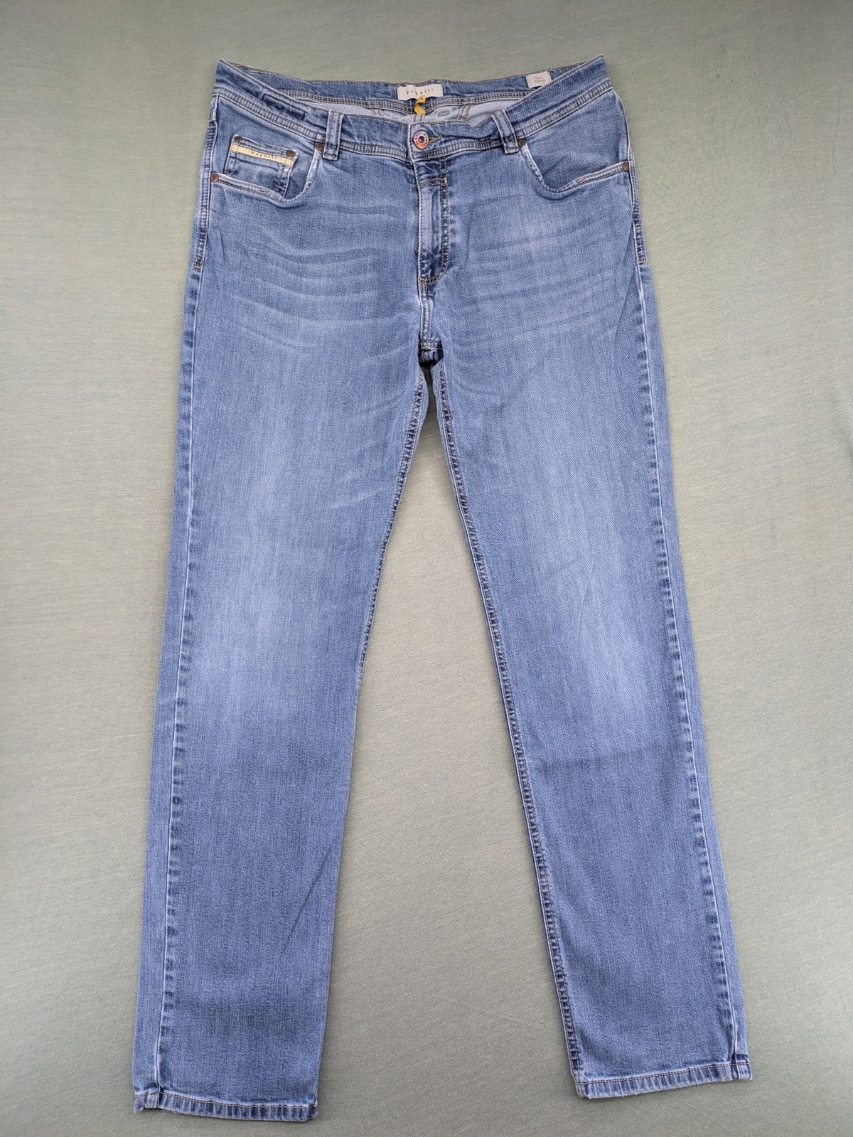 Bugatti blue straight jeans with classic 5-pocket design and light wash denim.