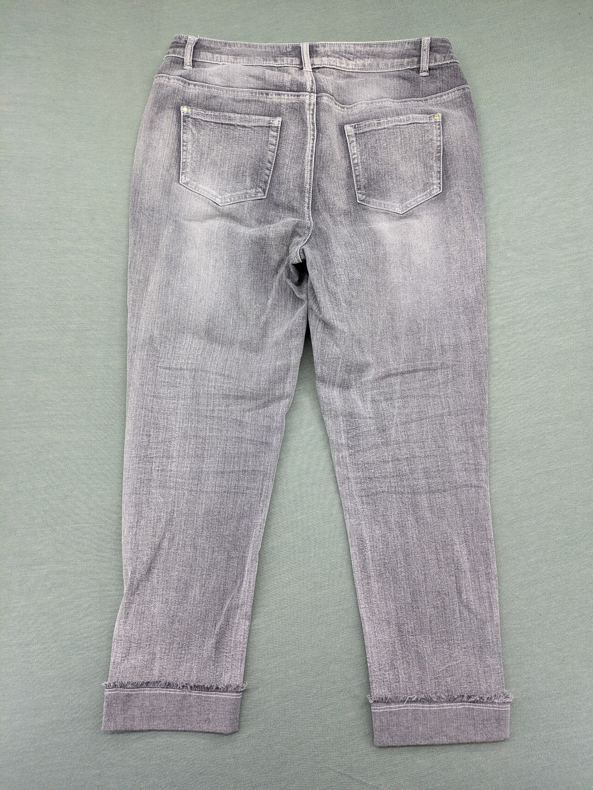 Rick Cardona grey cropped straight jeans with frayed hems and sparkling rhinestone details.