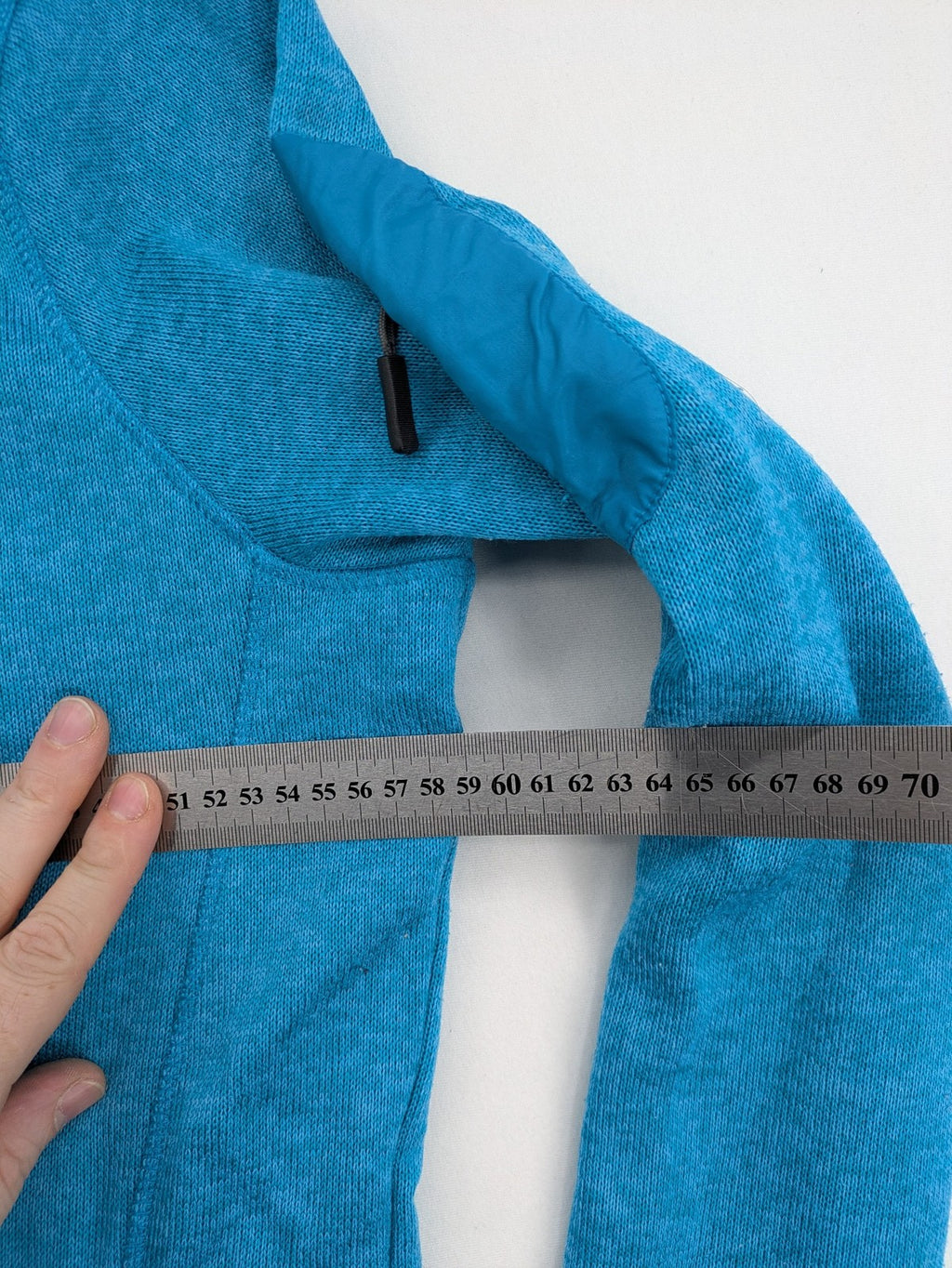 Stooker blue and turquoise fleece jacket with full zip and stand-up collar.