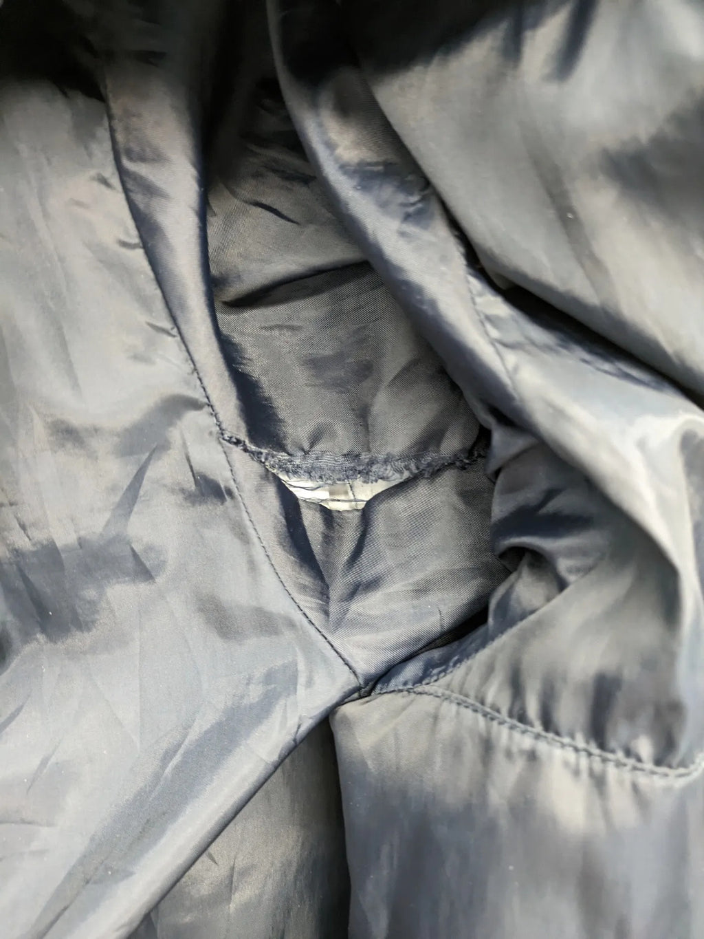 C&A blue winter jacket with hood, zip closure, and multiple pockets, used condition.