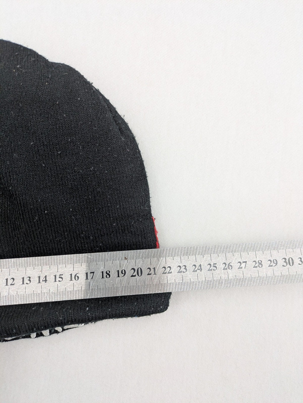 Star Wars black and red reversible beanie featuring Chewbacca graphic and logo.