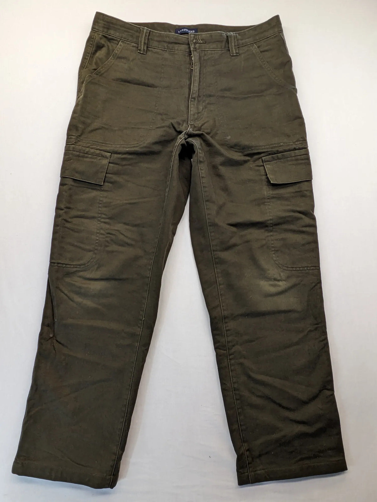 Lands' End green cargo pants with plaid flannel lining and traditional fit design.