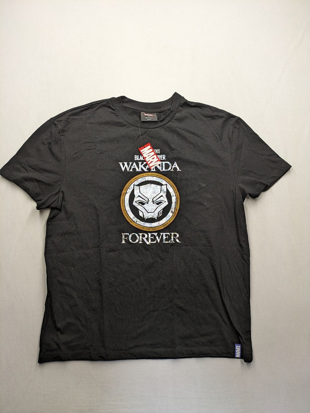 Black Panther black t-shirt foil graphic of Black Panther emblem and text.